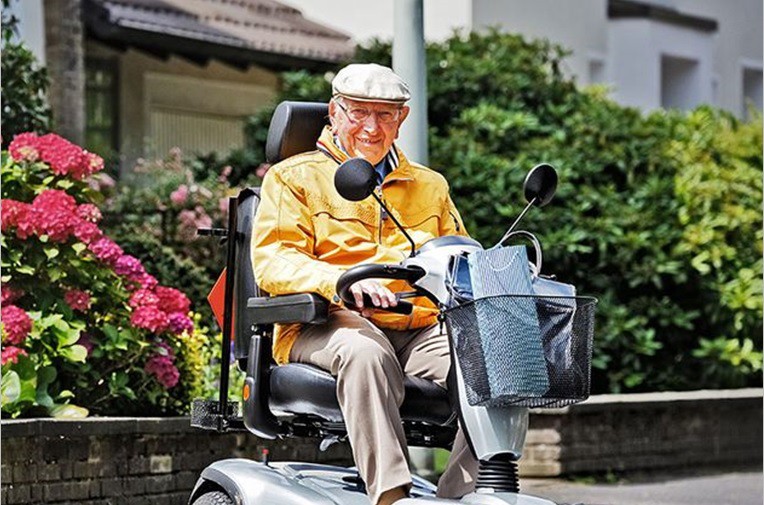 Heavy Duty Mobility Scooter User Enjoying a Drive