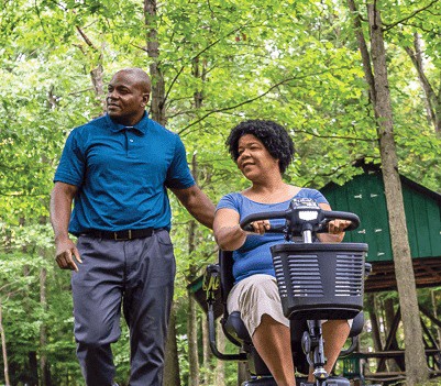 Revo 2.0 - 3-Wheel Scooter - Couple Enjoying the Outdoors