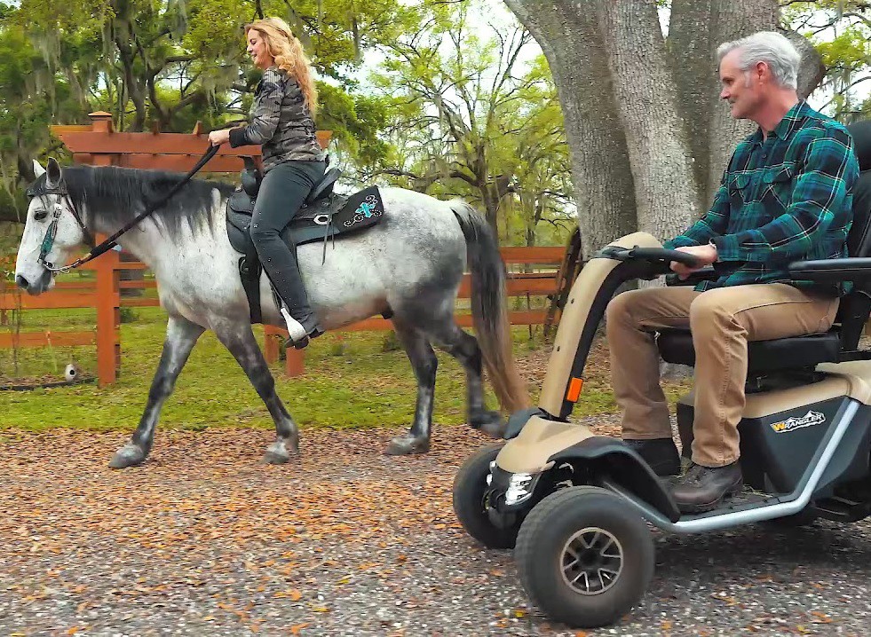 Man on 4 Wheel All-Terrain Mobility Scooter at the Ranch