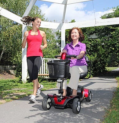 Go-Go Sport 4-Wheel Travel Scooter - Riding and Jogging