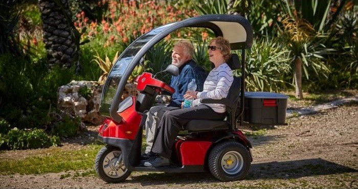 Afiscooter S3 _ S  - Dual Wide Seat Scooter With Canopy - Couple Enjoying Landscape
