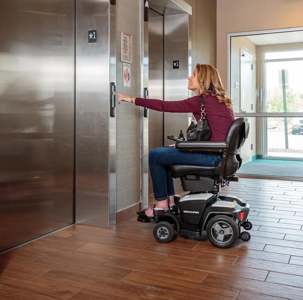 Go-Chair Power Chair Wheelchair - Taking a Ride in the Elevator in an Office Building - By Pride Mobility