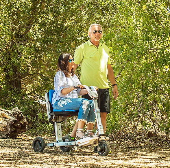 Couple Enjoying the Outdoors With Their 3-Wheel Portable Mobility Scooter