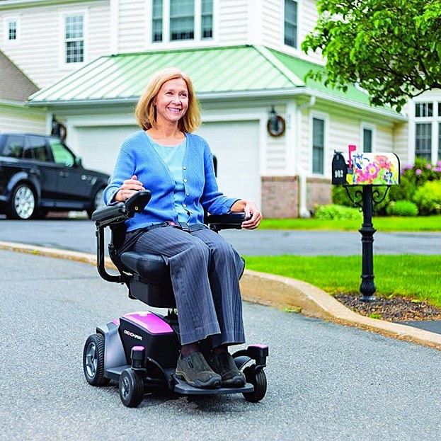 Go-Chair Power Chair Wheelchair - Taking a Ride to Visit a Neighbor - By Pride Mobility