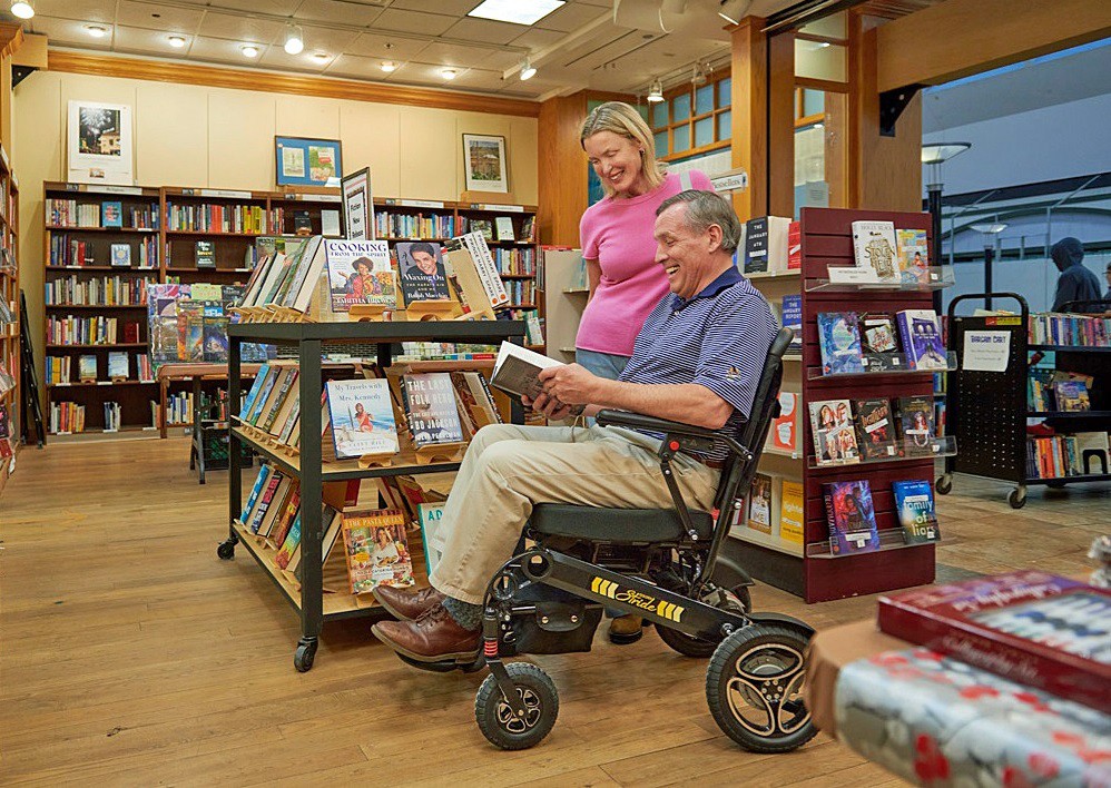 Man Enjoying Shopping With His Golden Technologies Power Chair 