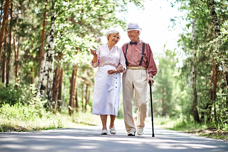 Walking Cane User Enjoying a Stroll in the Outdoors