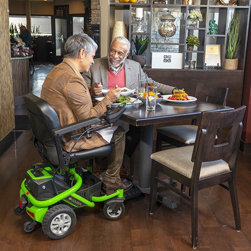 LiteRider Envy Power Chair - Couple Enjoying Dinner Together - By Golden Technologies